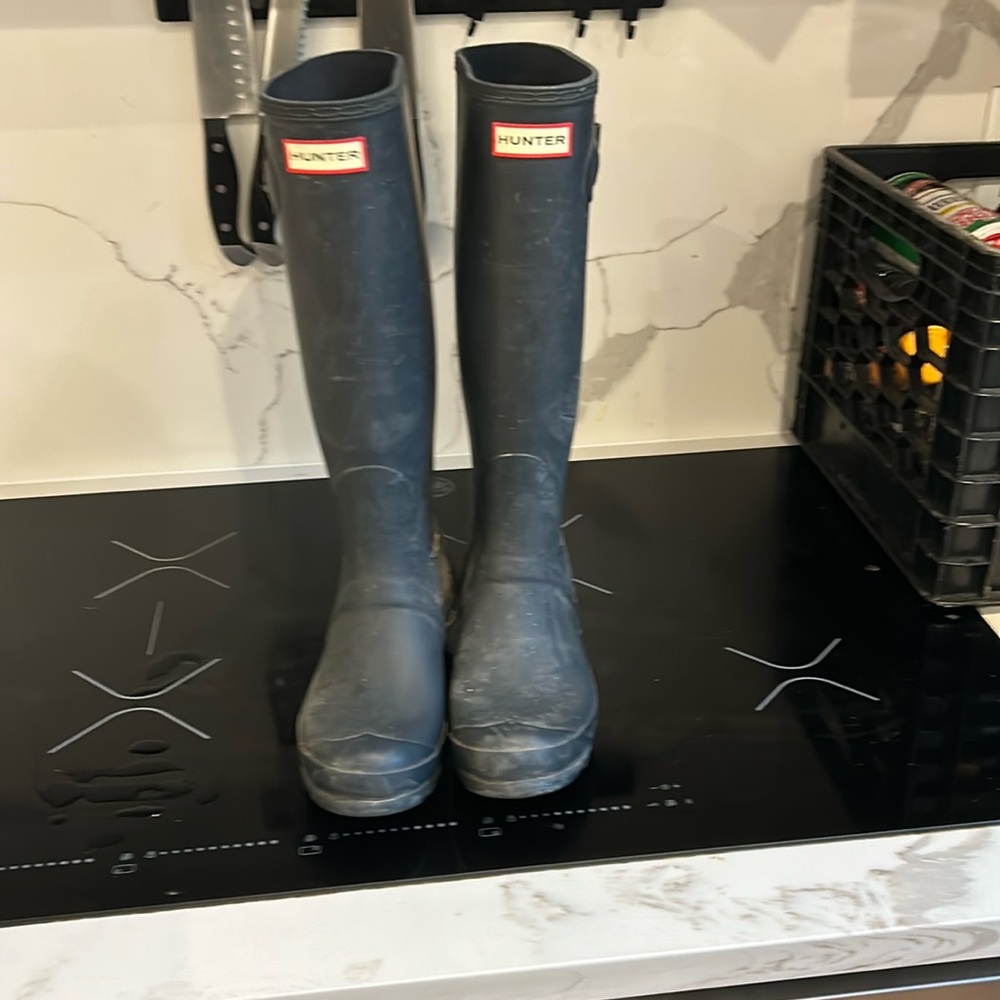 Navy blue knee high Hunter rain boots